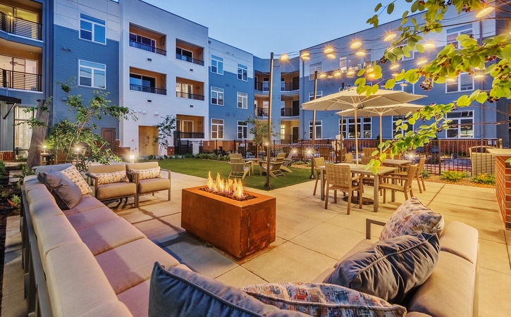 The Edition on Oberlin Raleigh NC Apartments and Townhomes Resort Style Pool Fire Pit Lounge Night